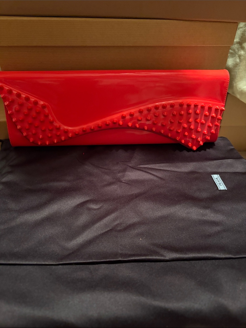 Christian Louboutin Patent Spike-Embellished Red Clutch